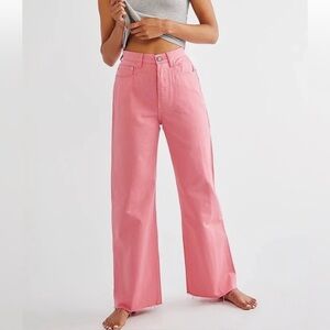 Boyish pink Charley raw hem button fly jeans